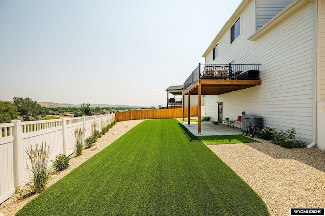 view of yard featuring a patio and a fenced backyard