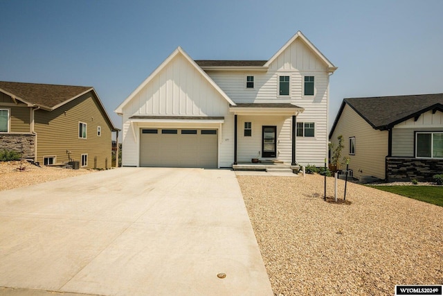 view of front of house featuring central AC unit, board and batten siding, an attached garage, and driveway