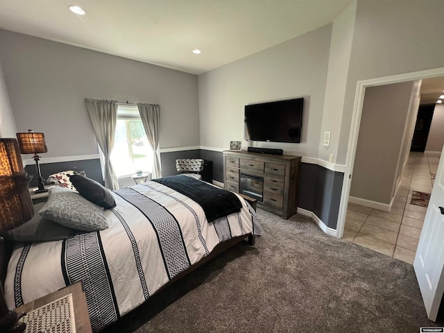 bedroom featuring light tile patterned floors