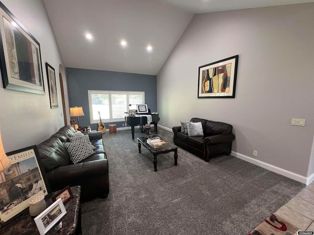 living room with high vaulted ceiling and tile patterned flooring