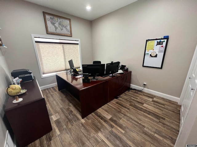 office with dark wood-type flooring