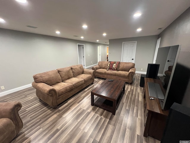 living room with hardwood / wood-style flooring