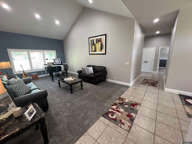 living room with high vaulted ceiling and light colored carpet