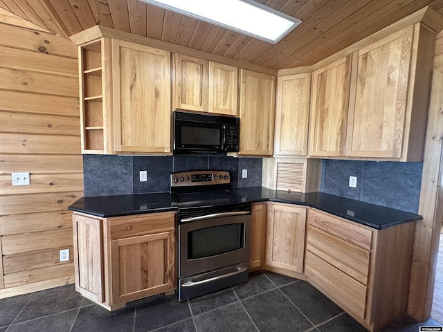 kitchen featuring dark countertops, electric range, light brown cabinets, and black microwave