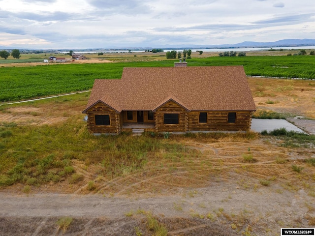 birds eye view of property featuring a rural view