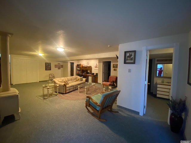 living room featuring decorative columns