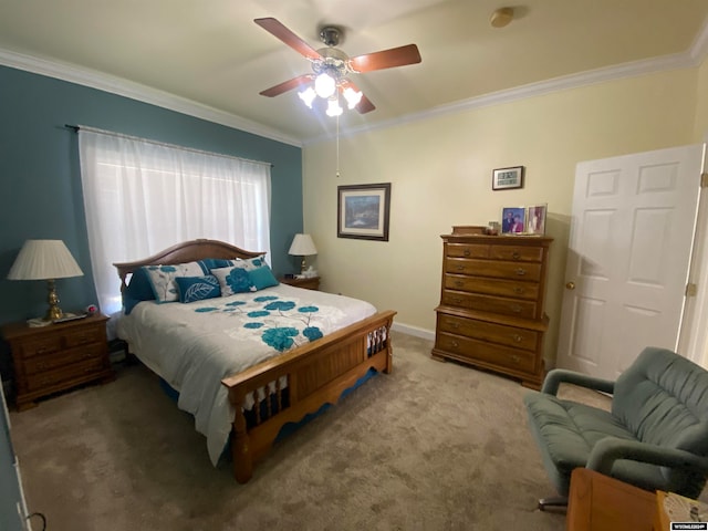 bedroom featuring crown molding, carpet, and ceiling fan