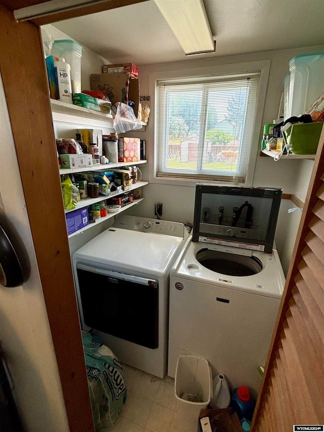 laundry room featuring washer and dryer