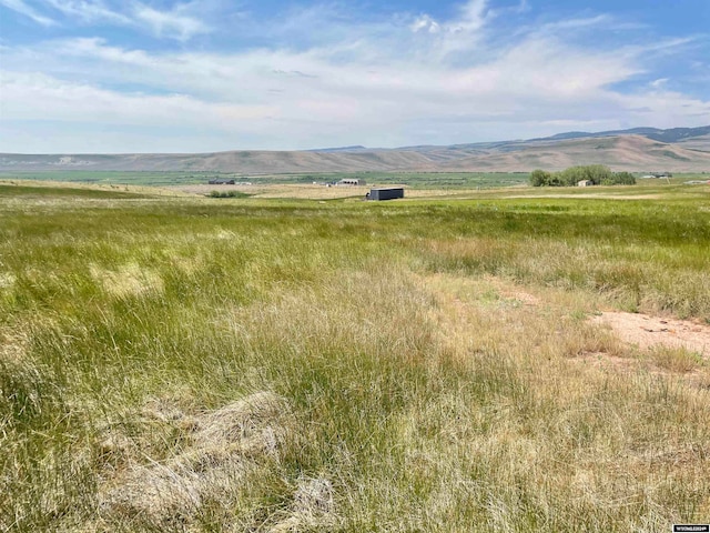 property view of mountains featuring a rural view