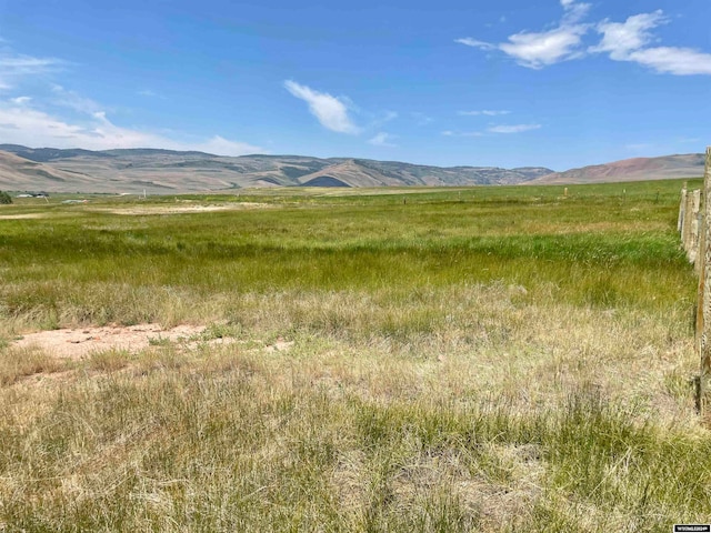 mountain view featuring a rural view