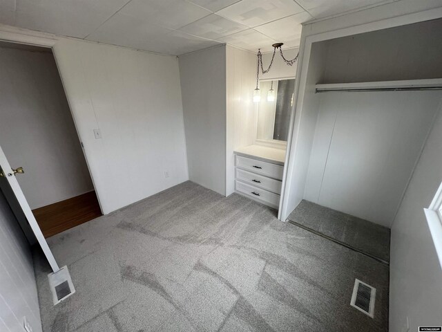 309 S Cherry, Pavillion, WY 82523 - unfurnished bedroom with carpet flooring and a closet