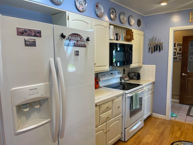 kitchen with white appliances, light hardwood / wood-style flooring, ornamental molding, and backsplash