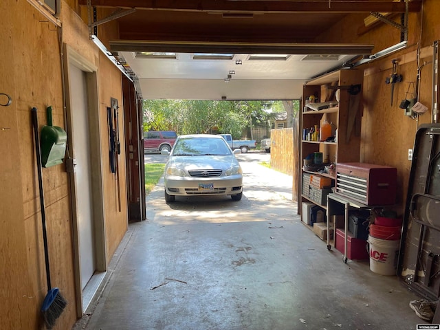 garage featuring a carport