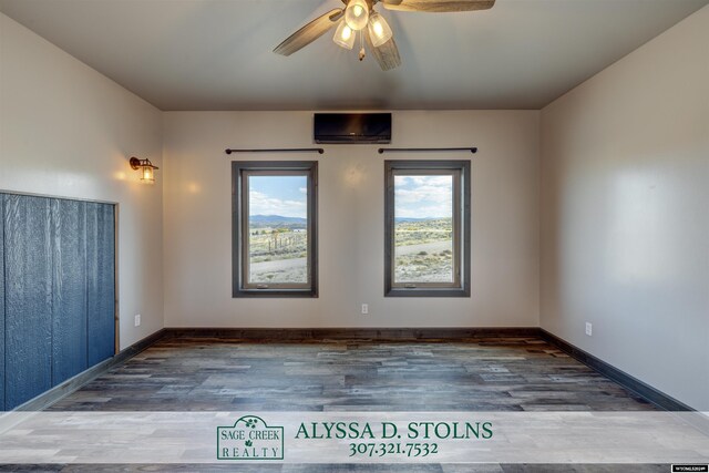 living room featuring ceiling fan and plenty of natural light