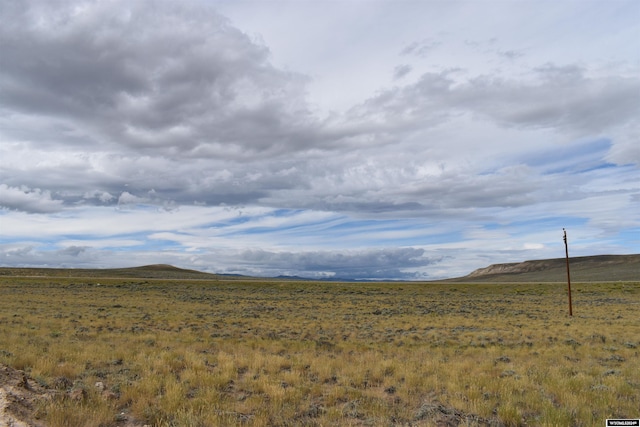 view of mountain feature with a rural view