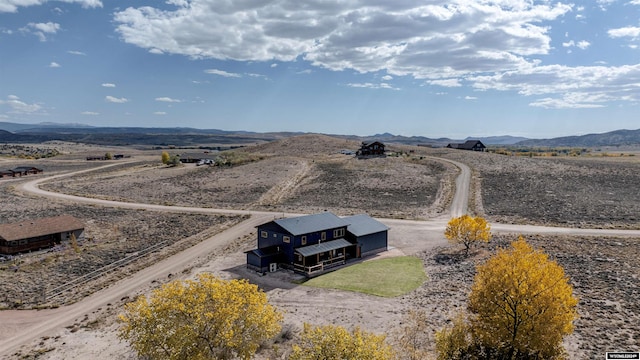 bird's eye view with a rural view and a mountain view