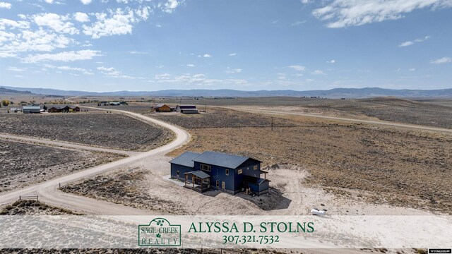 property view of mountains with a rural view