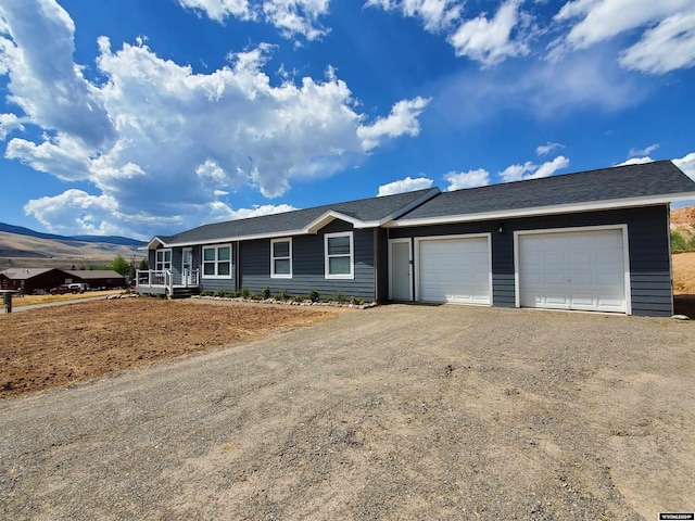 single story home with a garage