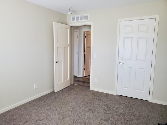 unfurnished bedroom with carpet flooring