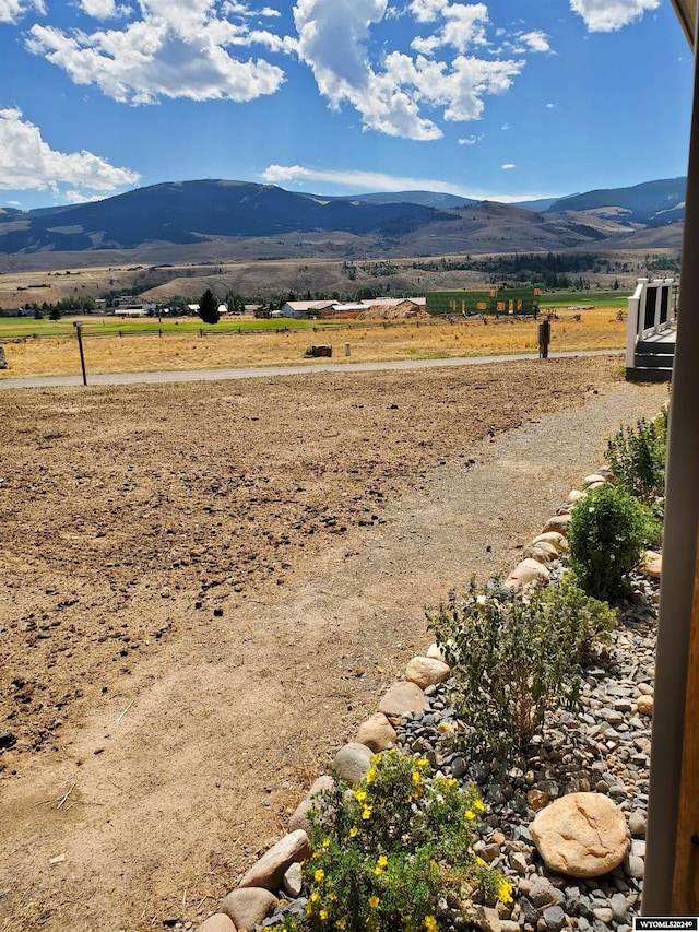 property view of mountains featuring a rural view