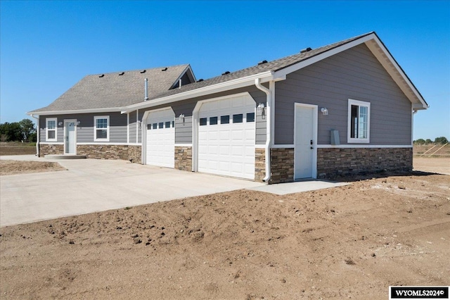 view of property exterior featuring a garage