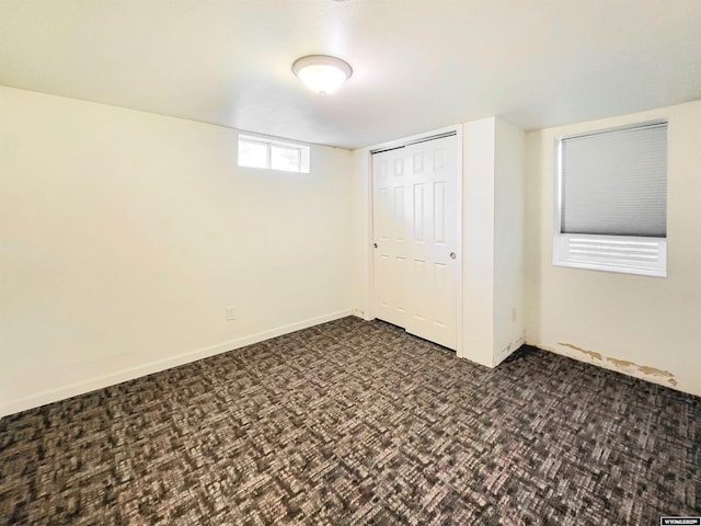 interior space with a closet and baseboards