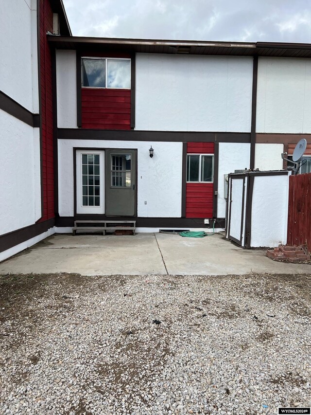 back of house with a patio area