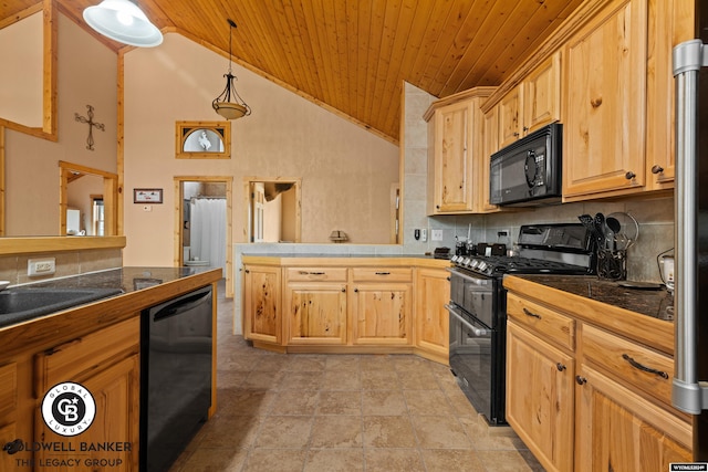 kitchen featuring hanging light fixtures, light tile patterned floors, black appliances, kitchen peninsula, and decorative backsplash