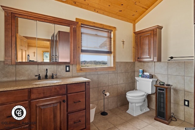 bathroom with tile patterned floors, wood ceiling, toilet, lofted ceiling, and tile walls