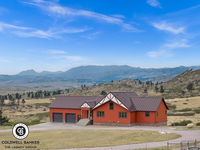 view of mountain feature with a rural view