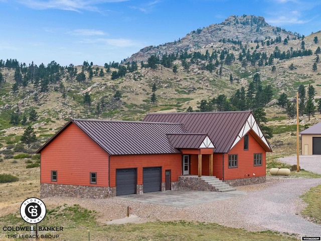 view of front of property with a mountain view