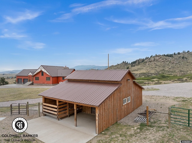 exterior space featuring a mountain view