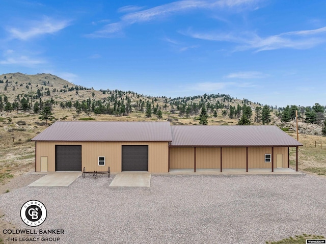 garage featuring a mountain view