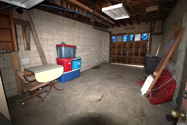 213 10th Ave, Lyman, NE 69352 - basement featuring a garage and concrete block wall