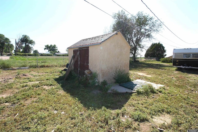 213 10th Ave, Lyman, NE 69352 - view of shed featuring fence