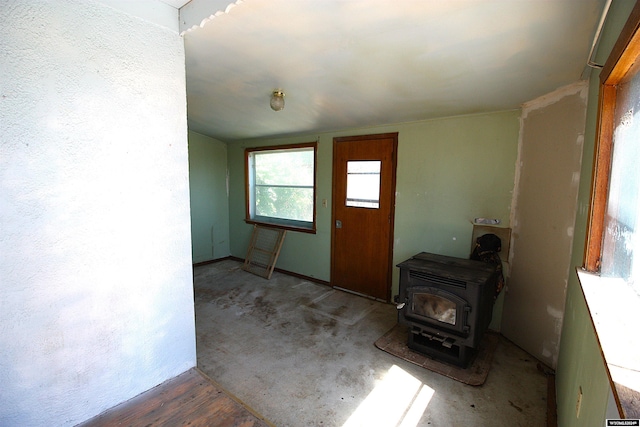213 10th Ave, Lyman, NE 69352 - entrance foyer with a wood stove
