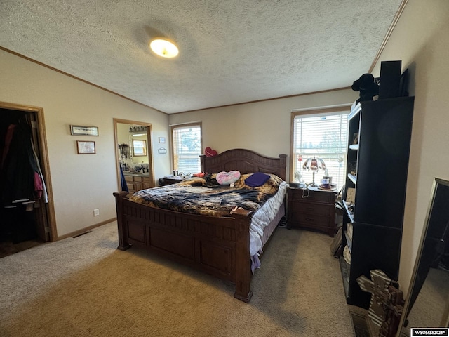 bedroom with multiple windows, lofted ceiling, light colored carpet, and ornamental molding