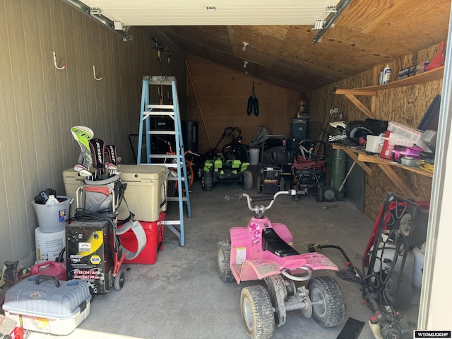 garage with wood walls