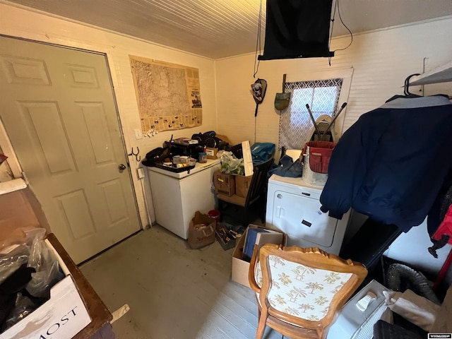 laundry area featuring wood-type flooring