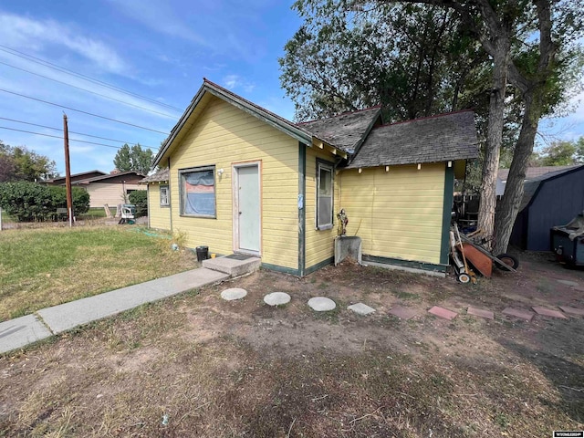 exterior space with a front lawn