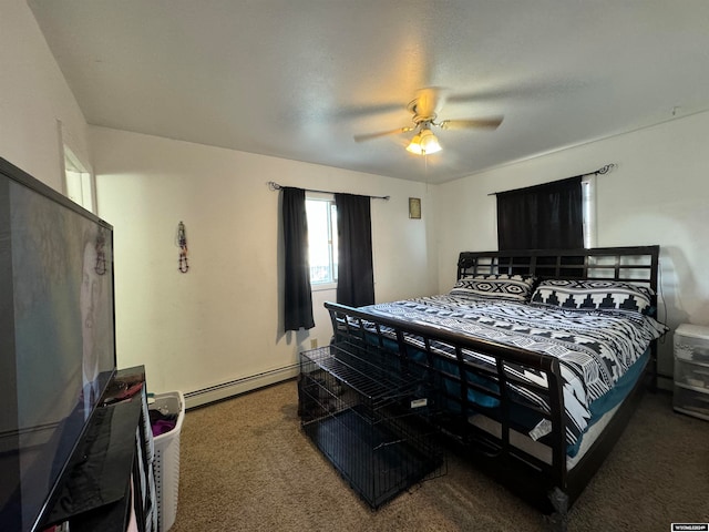 bedroom with a baseboard heating unit, ceiling fan, and carpet