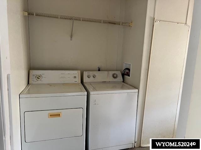 laundry area with washer and dryer