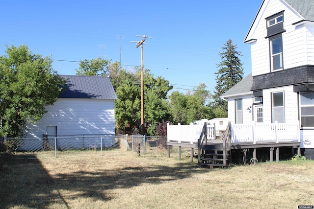 view of yard featuring a deck