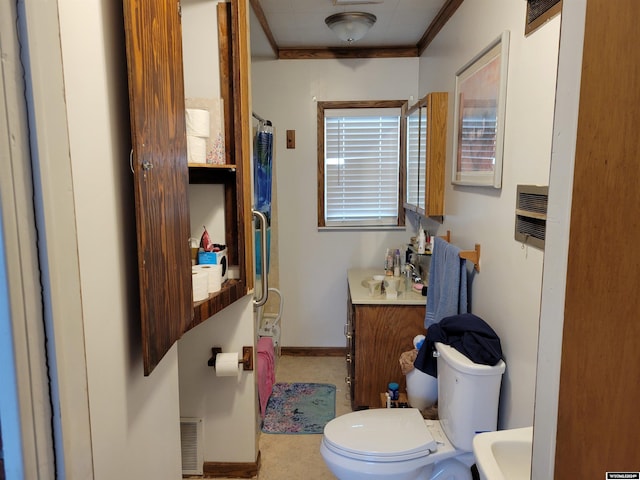 bathroom with vanity, toilet, ornamental molding, and a shower with curtain