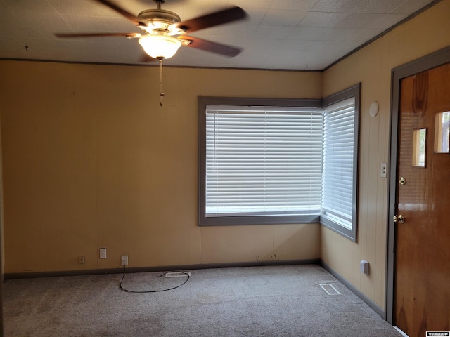 unfurnished room featuring carpet flooring and ceiling fan