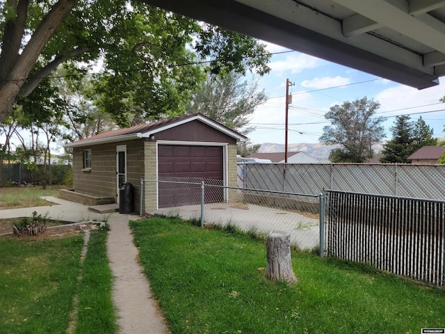 garage with a lawn