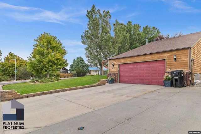 garage with a yard