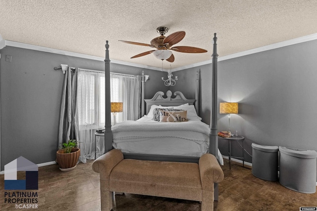 bedroom featuring ceiling fan, crown molding, and a textured ceiling