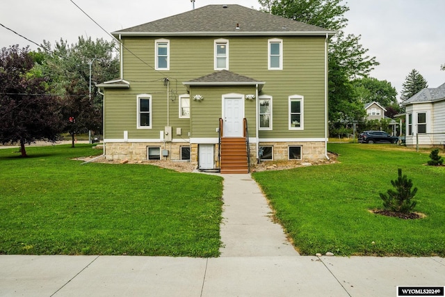 view of front facade with a front lawn