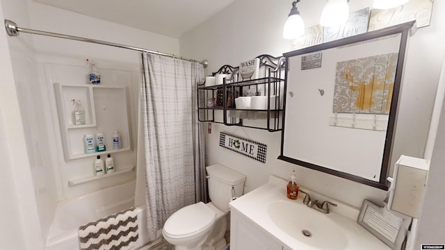 full bathroom featuring shower / bath combination with curtain, vanity, and toilet